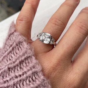 Lowest price Asscher cut three stone simulated sparkler. Size 4